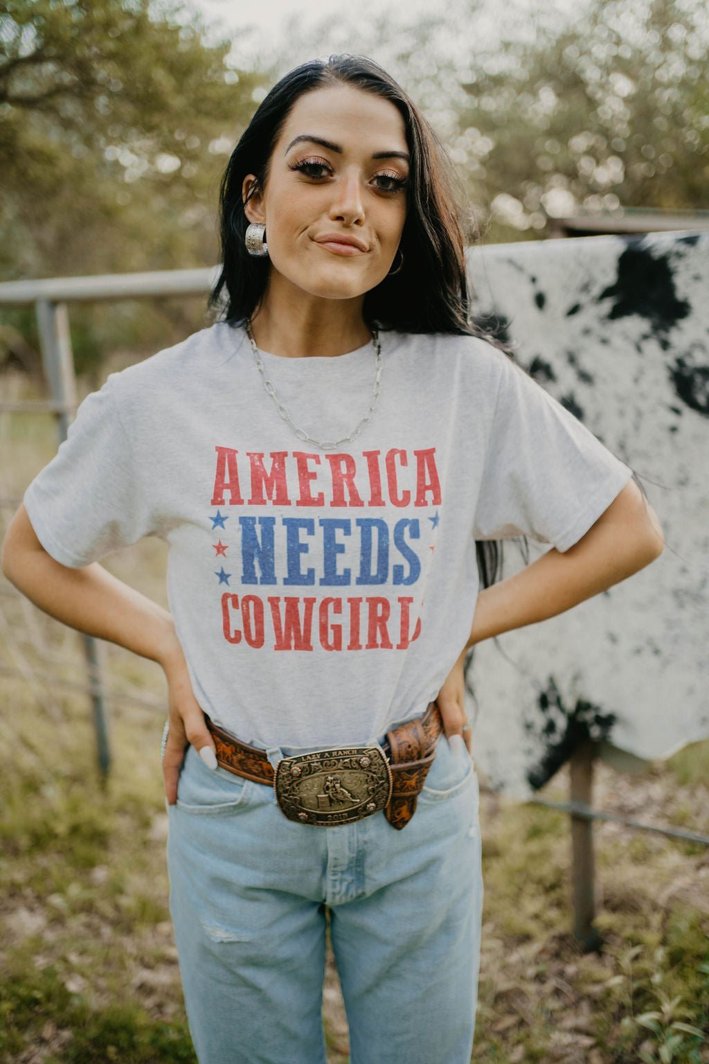 America Needs Cowgirls TeeWhiteS