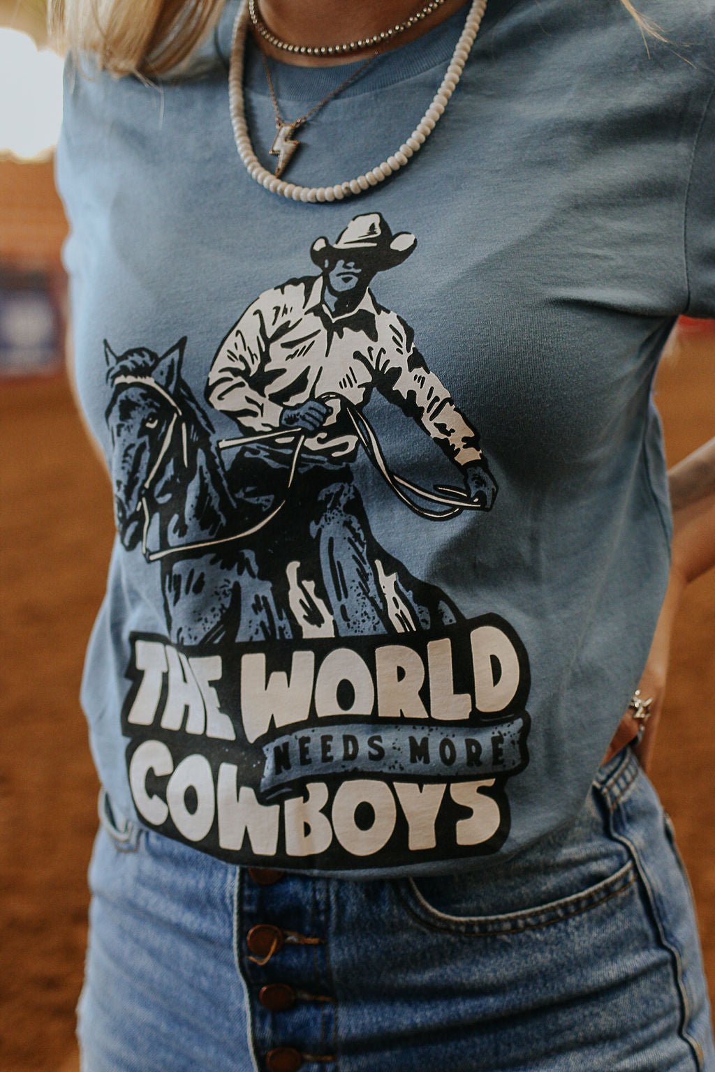 World Needs More Cowboys Graphic TeeBlueS